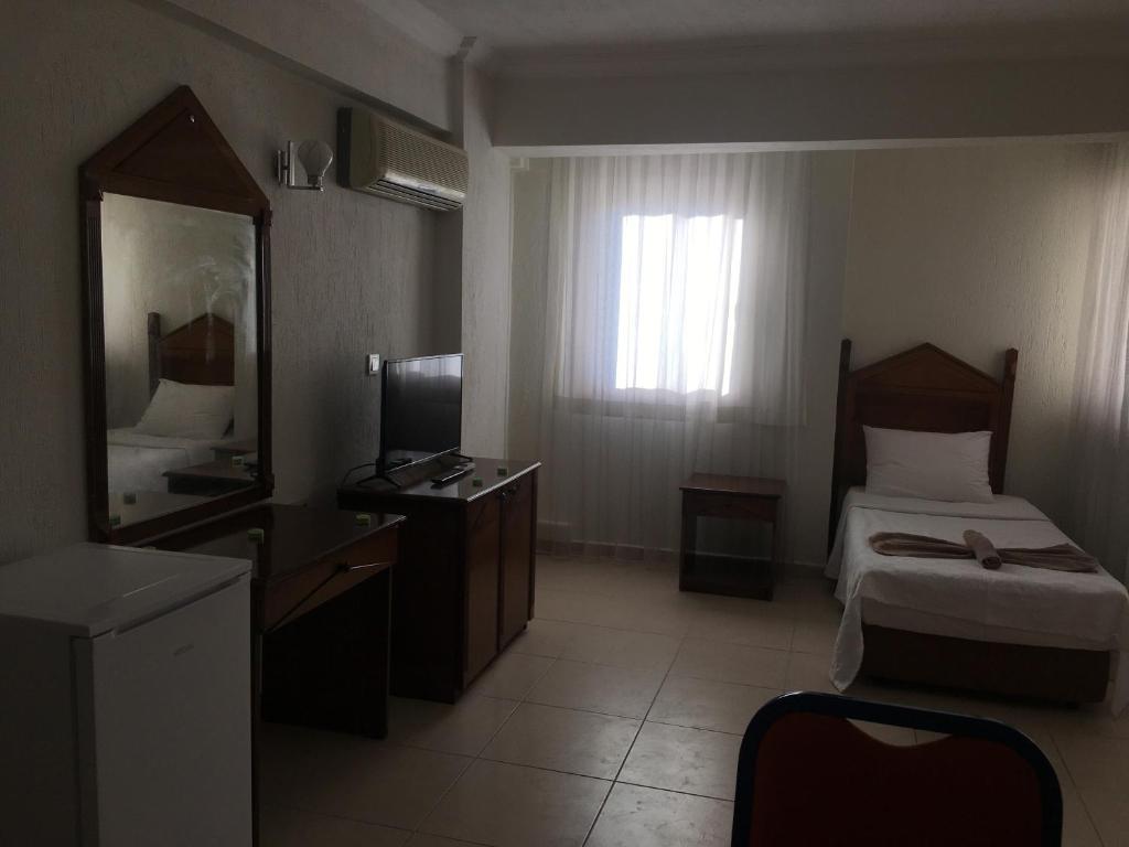 Postel nebo postele na pokoji v ubytování Mucize Termal Spa