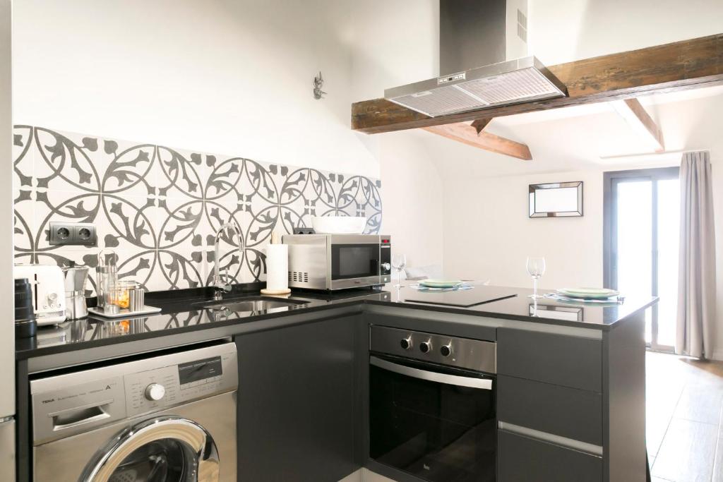 Kuchyňa alebo kuchynka v ubytovaní Aqua Apartments Málaga