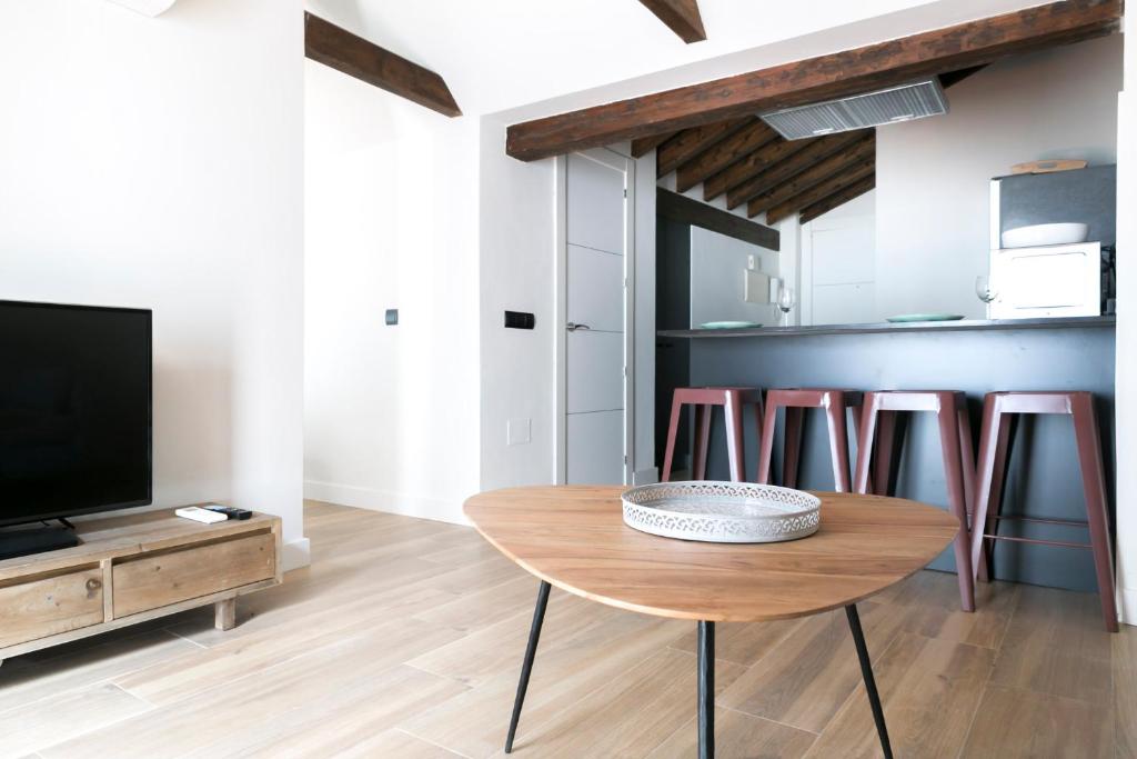 Televízia a/alebo spoločenská miestnosť v ubytovaní Aqua Apartments Málaga
