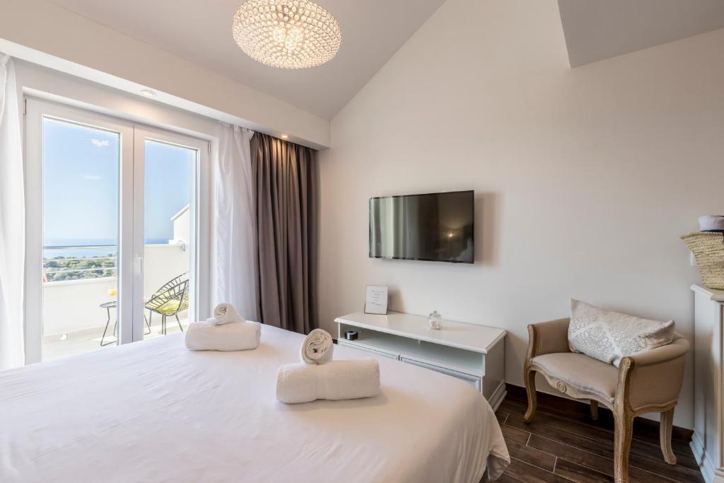 Postel nebo postele na pokoji v ubytování Hvar de luxe apartments 1