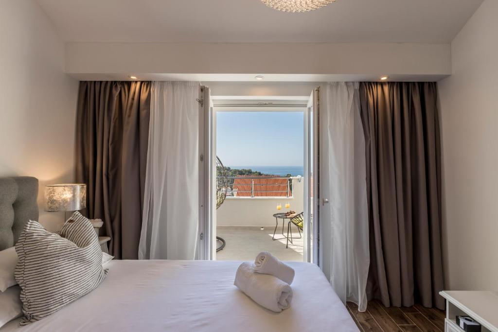 Postel nebo postele na pokoji v ubytování Hvar de luxe apartments 1