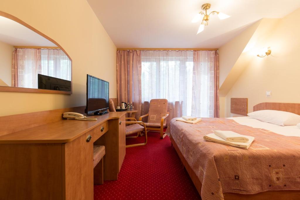 TV a/nebo společenská místnost v ubytování Paradiso Park