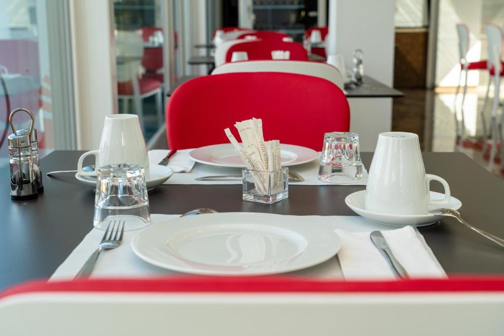 Restaurace v ubytování Nash Pratik Hotel