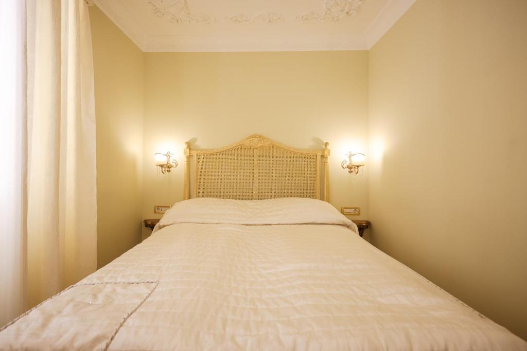Postel nebo postele na pokoji v ubytování Palazzo Venezia-Adults Only