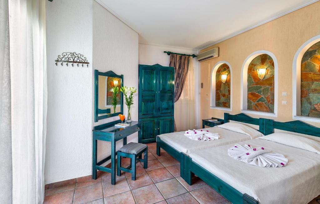 Postel nebo postele na pokoji v ubytování Hotel Castle Suites