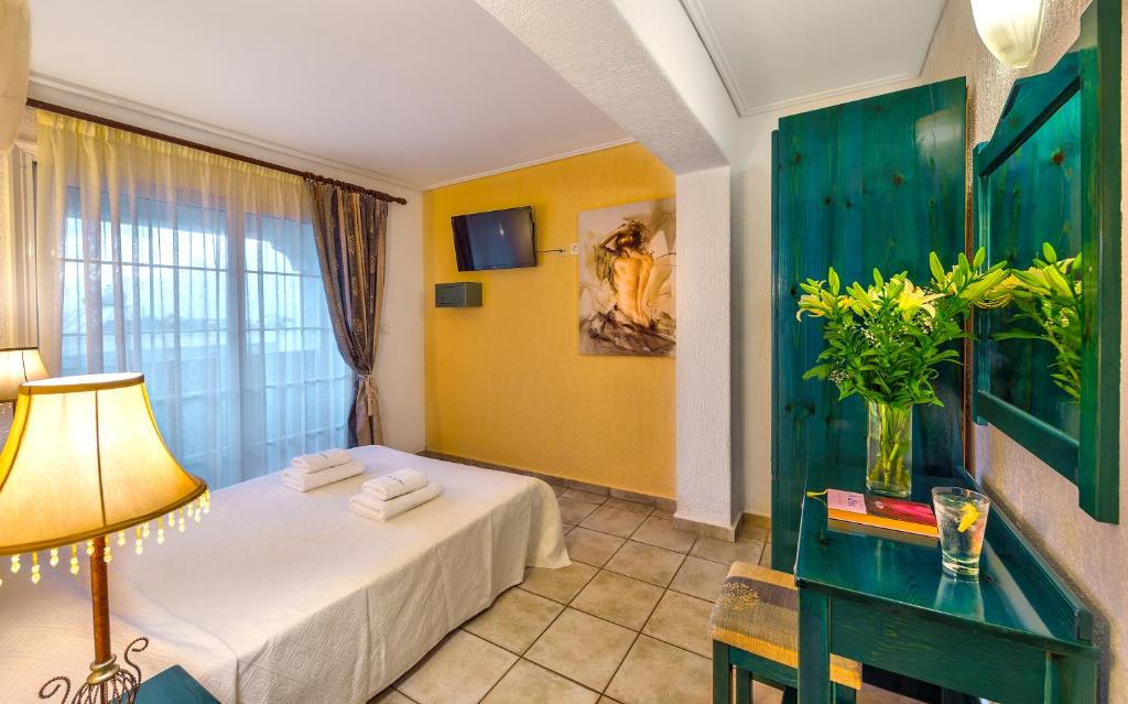 Postel nebo postele na pokoji v ubytování Hotel Castle Suites