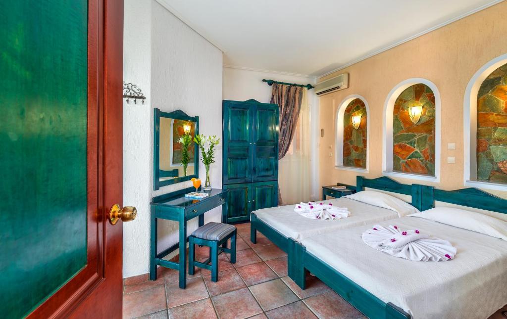 Postel nebo postele na pokoji v ubytování Hotel Castle Suites