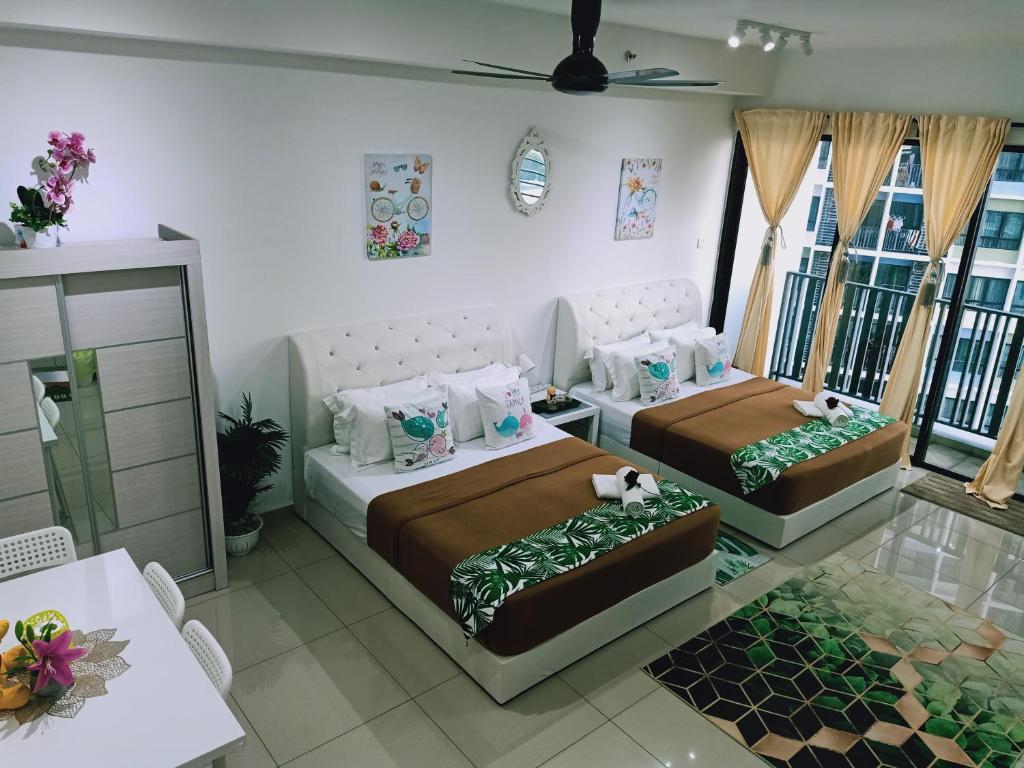 Postel nebo postele na pokoji v ubytování D'Gunduls Homestay STUDIO by DGH I-CITY