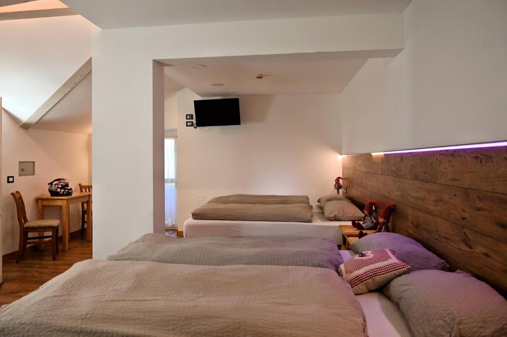 Postel nebo postele na pokoji v ubytování Albergo Panorama