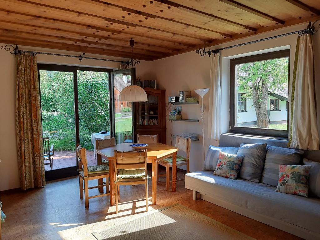 a living room with a couch and a table at Haasenhaus in Hinterstoder