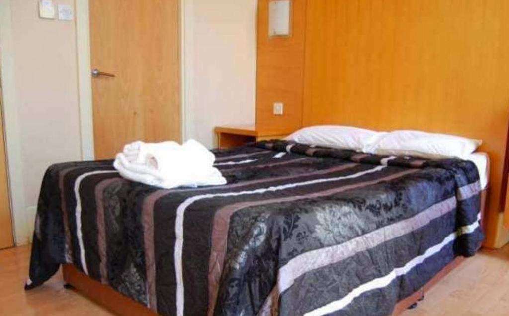 Postel nebo postele na pokoji v ubytování Berkeley Court Hotel