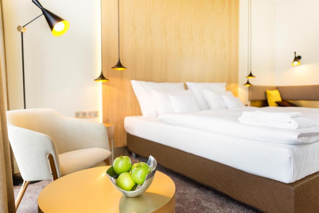 Postel nebo postele na pokoji v ubytování Hotel Golf Prague