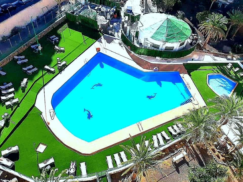Bazén v ubytování PLAYA DEL INGLES LOS MOLINOS 115 nebo v jeho okolí