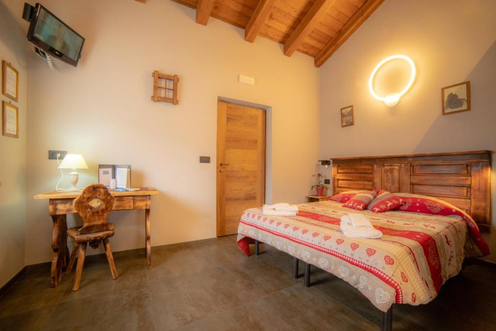 Postel nebo postele na pokoji v ubytování Hotel Chacaril