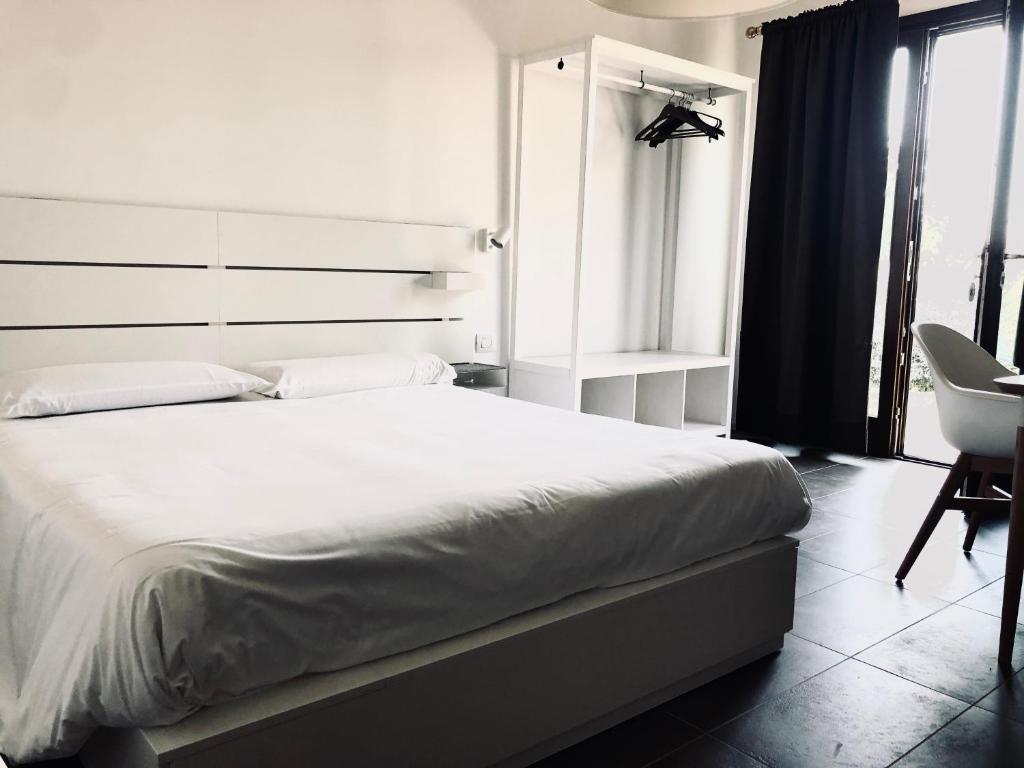 Postel nebo postele na pokoji v ubytování A3Passi