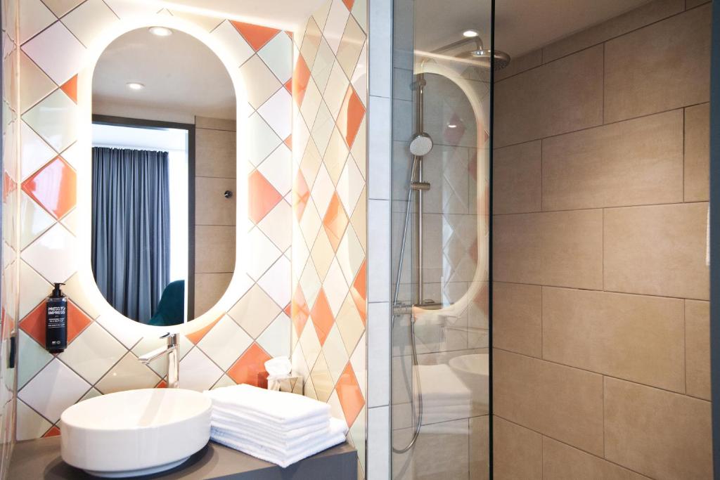 Vannituba majutusasutuses ibis Styles Klagenfurt am Woerthersee