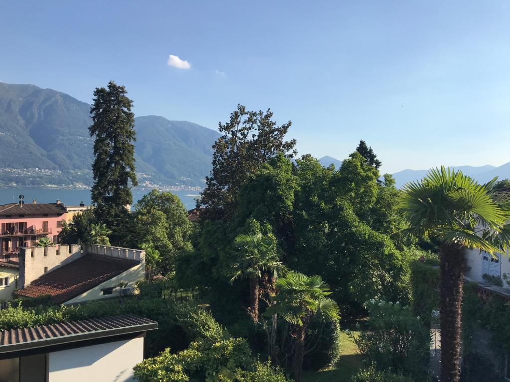 a view from the roof of a house with trees at Muralto-Locarno: Miramonti Apt. 17 in Locarno