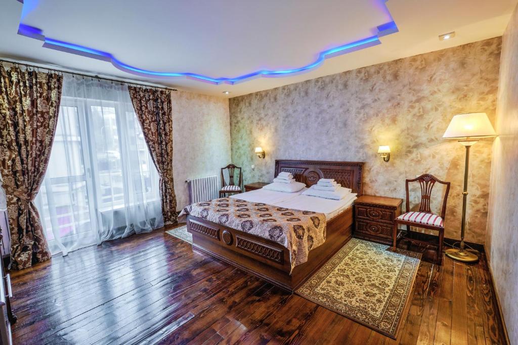 Postel nebo postele na pokoji v ubytování VICTOR Hotel Resort & SPA