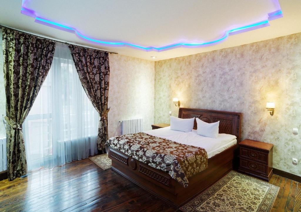 Postel nebo postele na pokoji v ubytování VICTOR Hotel Resort & SPA