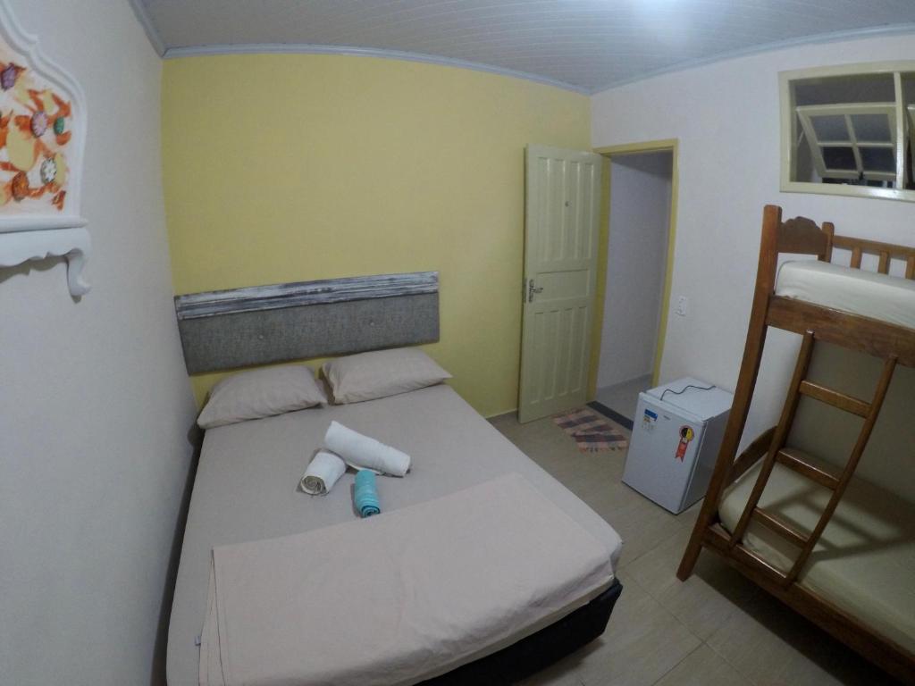 Postel nebo postele na pokoji v ubytování Ilha Grande Mar