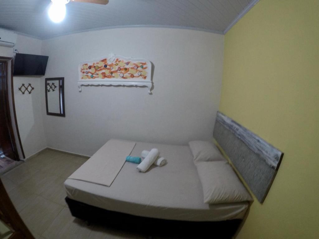 Postel nebo postele na pokoji v ubytování Ilha Grande Mar