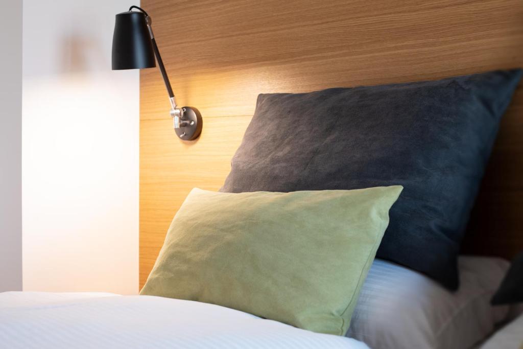 Postel nebo postele na pokoji v ubytování Hotel Thalmair