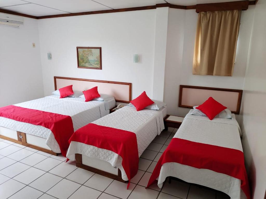 Postel nebo postele na pokoji v ubytování Hotel Portal De Eunápolis