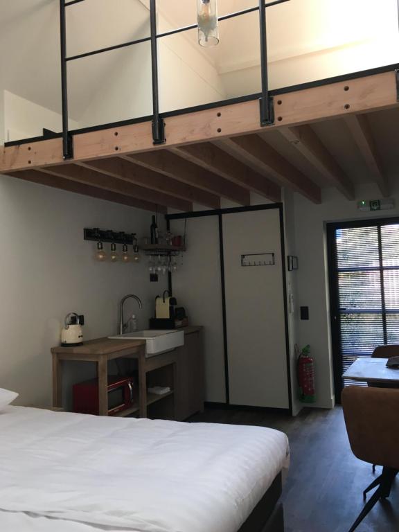 Postel nebo postele na pokoji v ubytování B&B Sint-Mariaburg