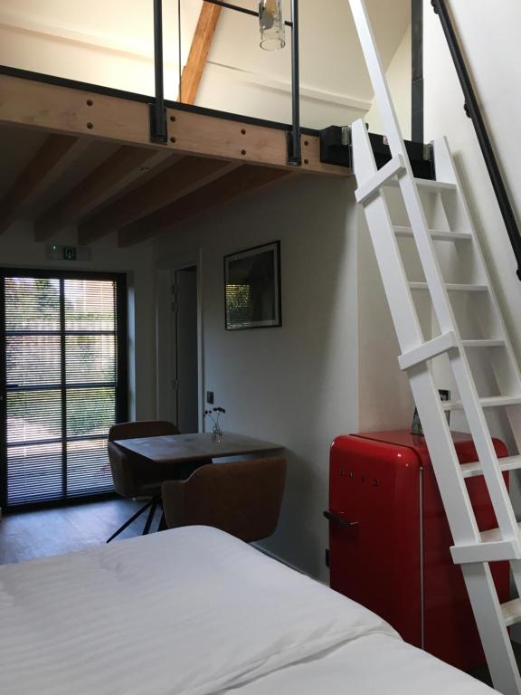 Postel nebo postele na pokoji v ubytování B&B Sint-Mariaburg