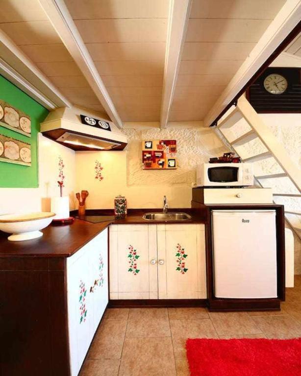 Kuchyň nebo kuchyňský kout v ubytování Casa do Sal