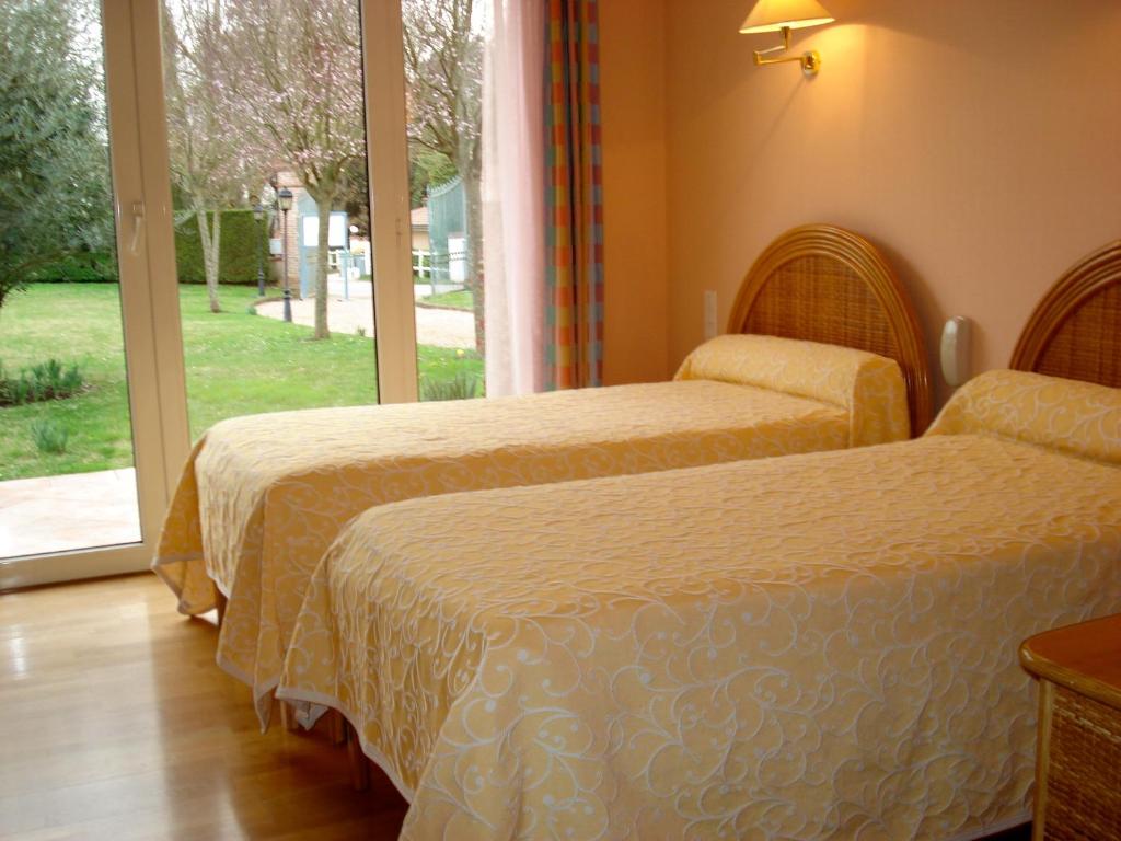 Voodi või voodid majutusasutuse L'Oustal du Lauragais toas