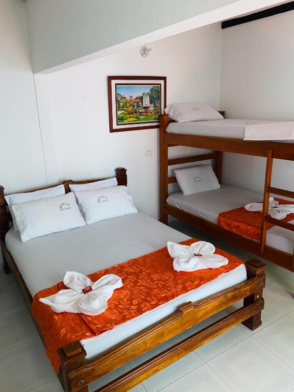 Postel nebo postele na pokoji v ubytování Hotel Paso Realce
