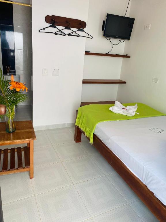 Postel nebo postele na pokoji v ubytování Hotel Paso Realce