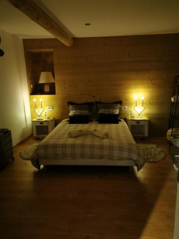 Postel nebo postele na pokoji v ubytování La Petite Chapelle