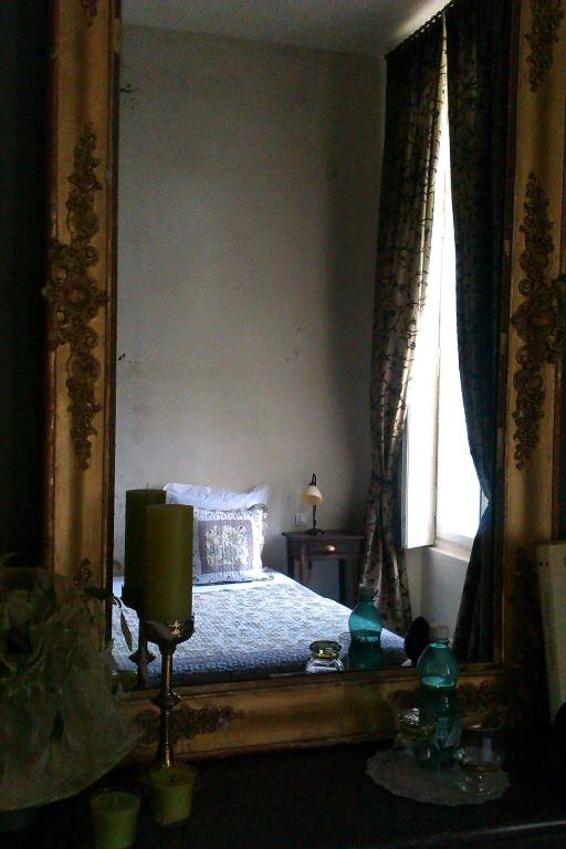 Postel nebo postele na pokoji v ubytování Manoir Larcouillet