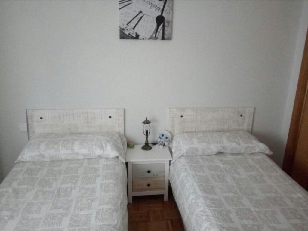 Posteľ alebo postele v izbe v ubytovaní Apartamento LA FRAGUA