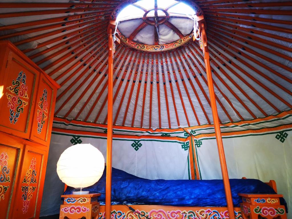 Postel nebo postele na pokoji v ubytování Camping Domaine de Mepillat