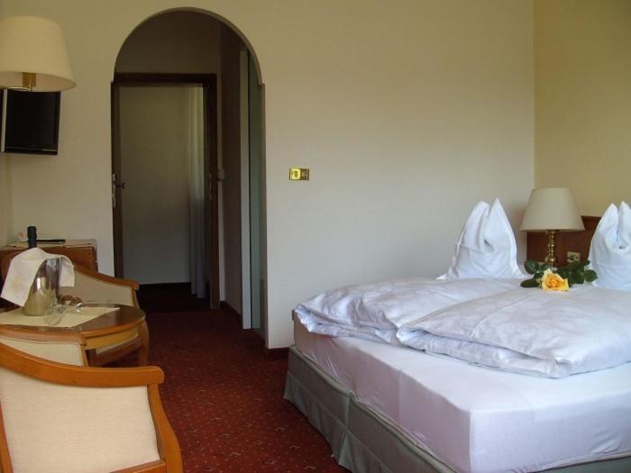 Postel nebo postele na pokoji v ubytování Hotel Annabell