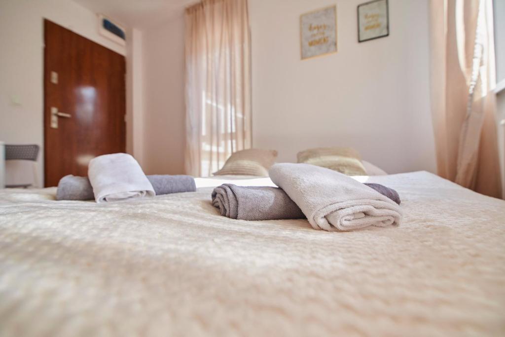Posteľ alebo postele v izbe v ubytovaní Regem Apartments Płońska