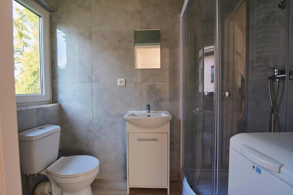 Kúpeľňa v ubytovaní Regem Apartments Płońska