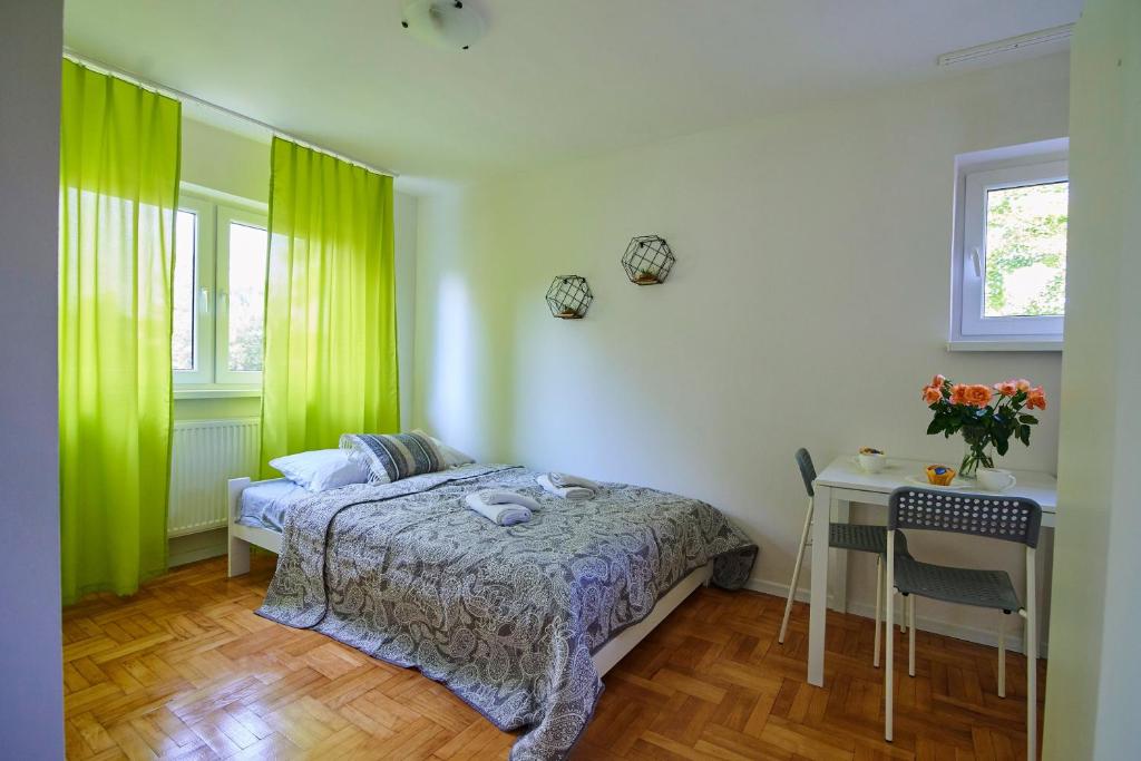 Posteľ alebo postele v izbe v ubytovaní Regem Apartments Płońska