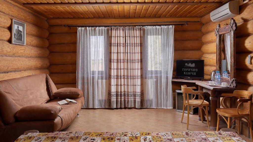 TV a/nebo společenská místnost v ubytování HOT SPRINGS