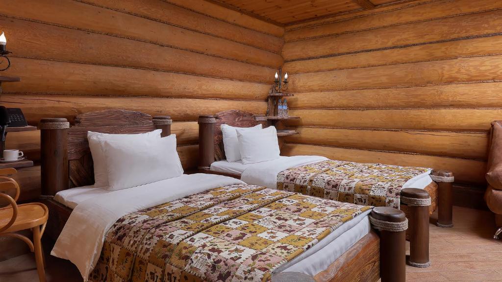 Postel nebo postele na pokoji v ubytování HOT SPRINGS