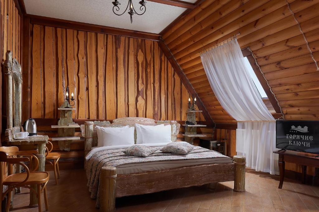 Postel nebo postele na pokoji v ubytování HOT SPRINGS