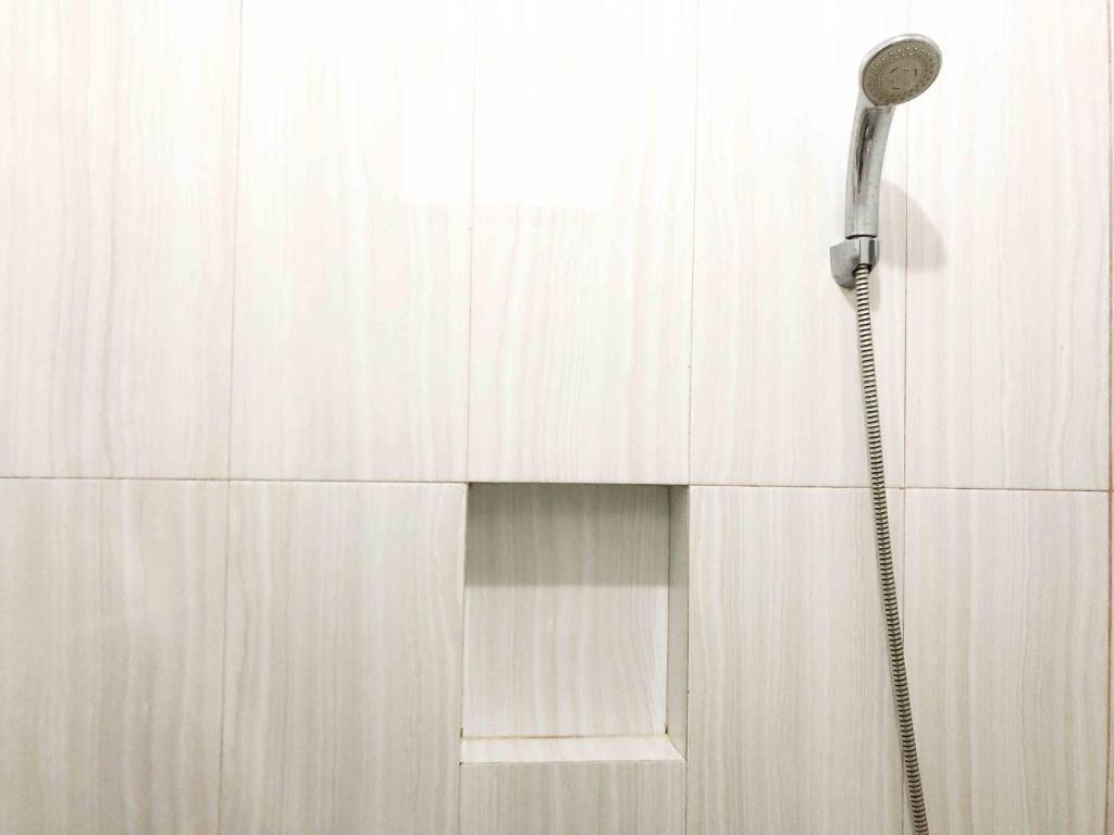 Koupelna v ubytování Sofia Residence Syariah Mitra RedDoorz