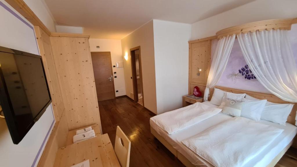 Postel nebo postele na pokoji v ubytování Affittacamere Dolce Sogno