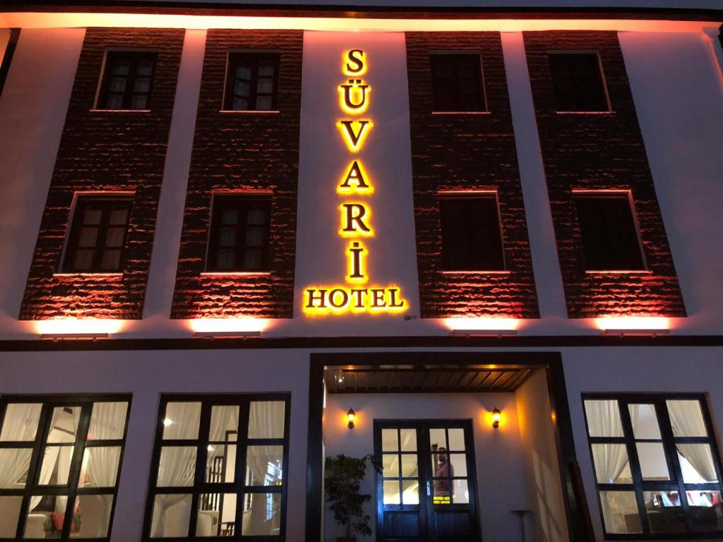 a hotel with a sign on the front of it at Süvari Hotel in Aksaray