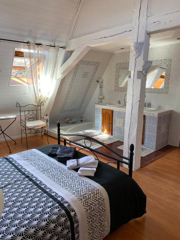Postel nebo postele na pokoji v ubytování Loft de Lancelot City Center
