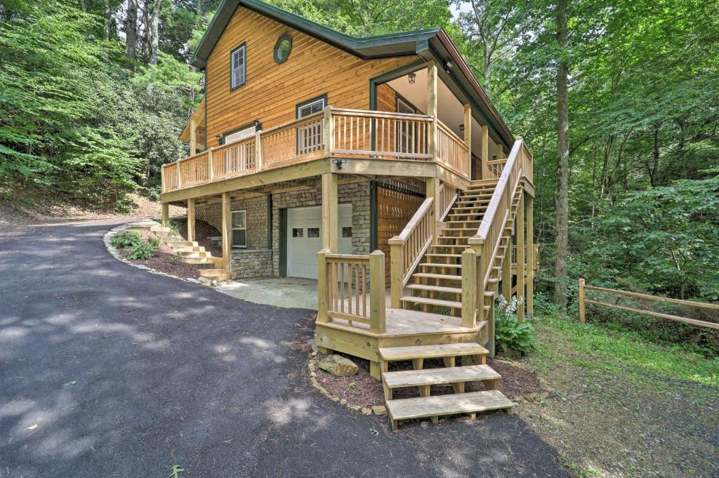 a large wooden house with stairs leading to a driveway at Large Mtn Cabin Golf, Lake, Resort Amenity Access in Newland