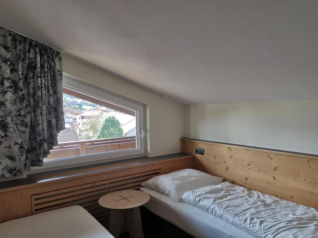 Postel nebo postele na pokoji v ubytování Hotel Sägerhof